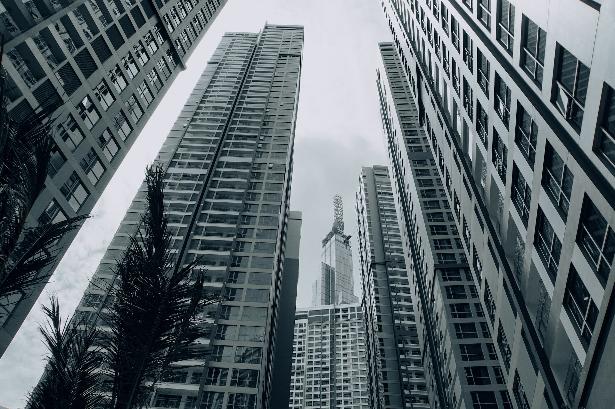 grayscale photo of high rise buildings